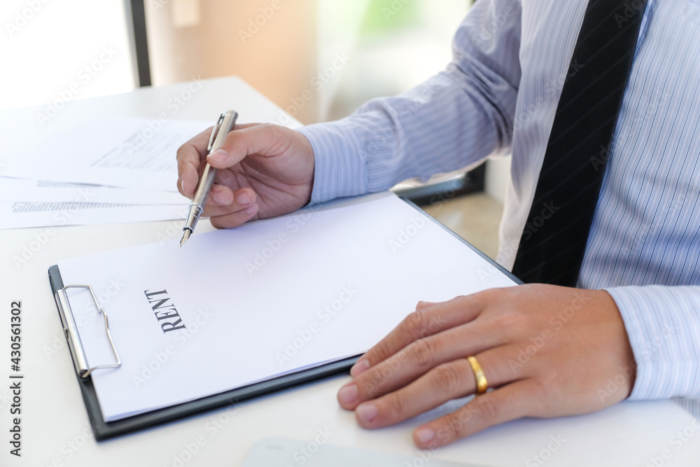 Business people signing contract making a deal with real estate agent Concept for consultant and home insurance concept.