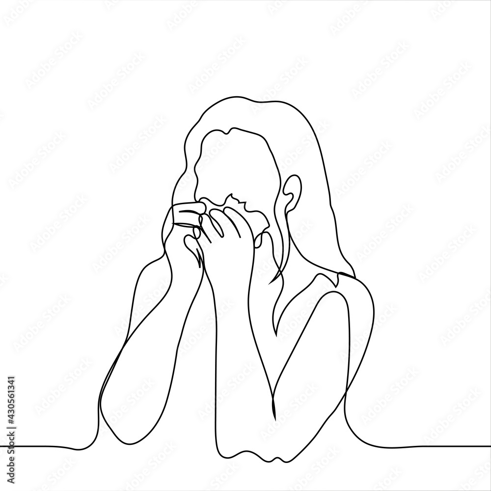 Woman crying holding a handkerchief with both hands to her face - one ...