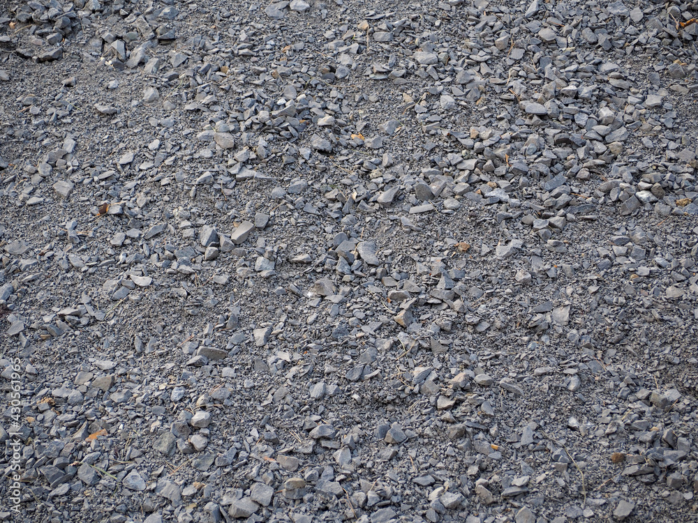 a lot of gray gravel. Gray background