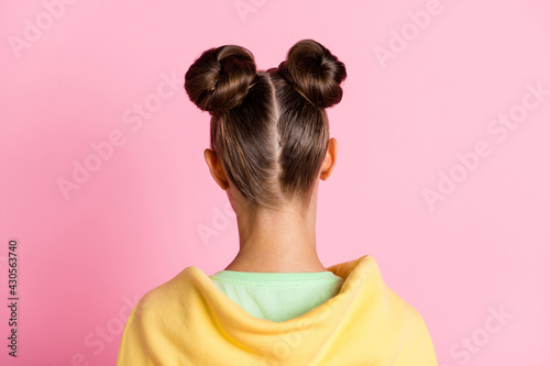 Back rear spine view photo of young woman wear yellow jumper on shoulder isolated on pastel pink color background
