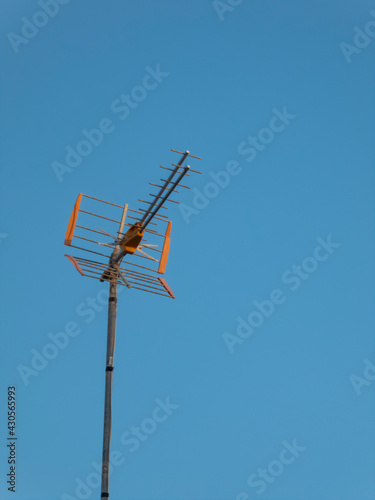 Antenna under a clear blue sky