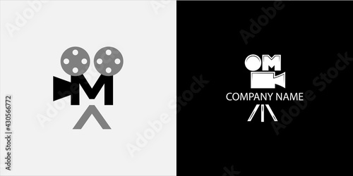camcorder with letter M inside, modern logo for film studio or director