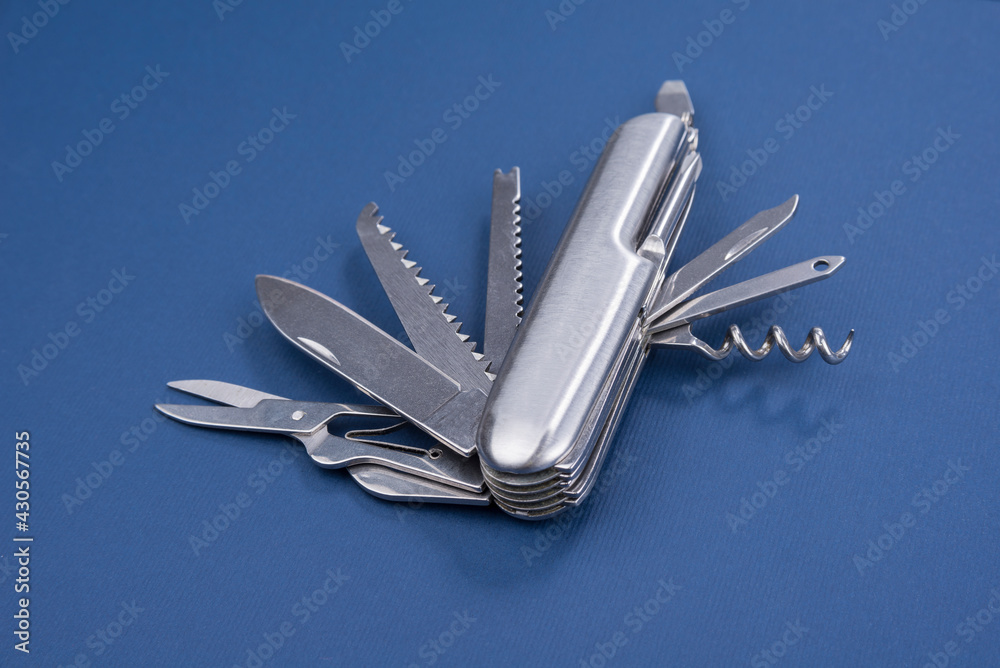 Swiss many task army knife. Multi tool pocket knife. Stock Photo