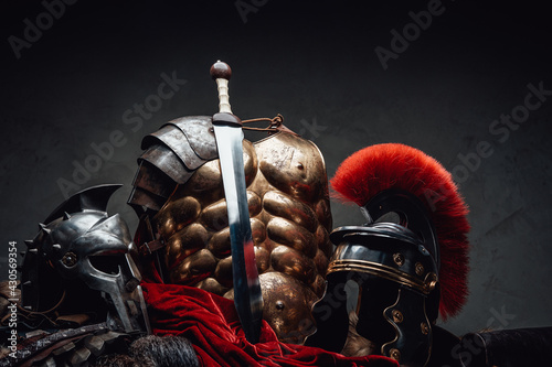 Canvas Print Ancient rome soldier and gladiator outfit and sword