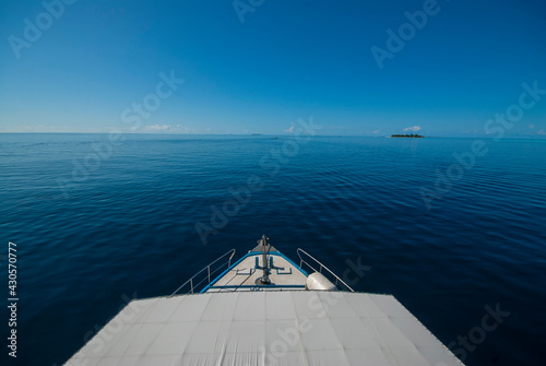 Motor boat on clear turquoise water. Maldives   © osman