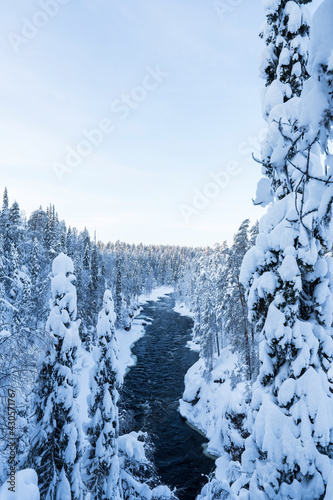 Aallokkokoski in Kuusamo in winter time. These rapids in Kitkajoki are popular rafting challenge.