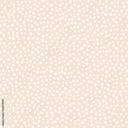 Abstract seamless vector pattern with spots. Simple irregular geometric design on beige background