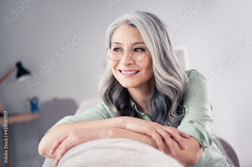 Принти на полотні Photo portrait of senior woman wearing glasses grey hair looking copyspace chill