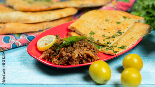 Qeema karahi with vegetable roghni naan India and Pakistan food photo