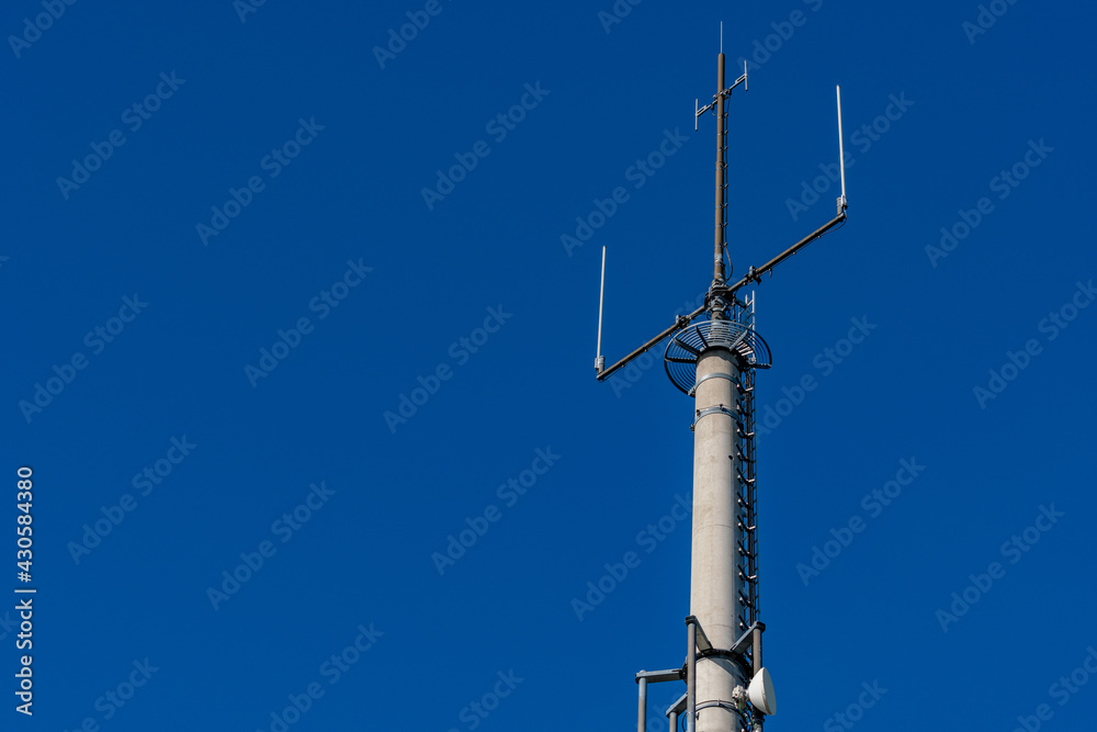 radio tower on blue sky for network