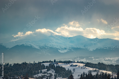 Winter in the mountains - small Ukrainian village in the Carpathians