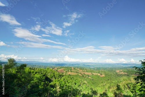 panorama of beautiful countryside of Phu Ruea  Loei Thailand  sunny afternoon. wonderful springtime landscape in mountains. grassy field and rolling hills. rural scenery.