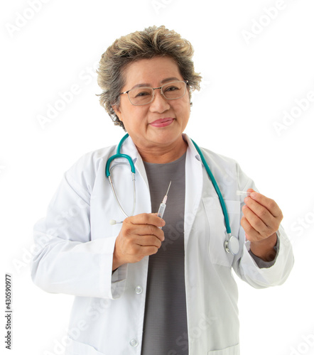 Senior asian female doctor hold syringe stop spread virus in Coronavirus outbreak or Covid-19, Concept of Covid-19 quarantine.