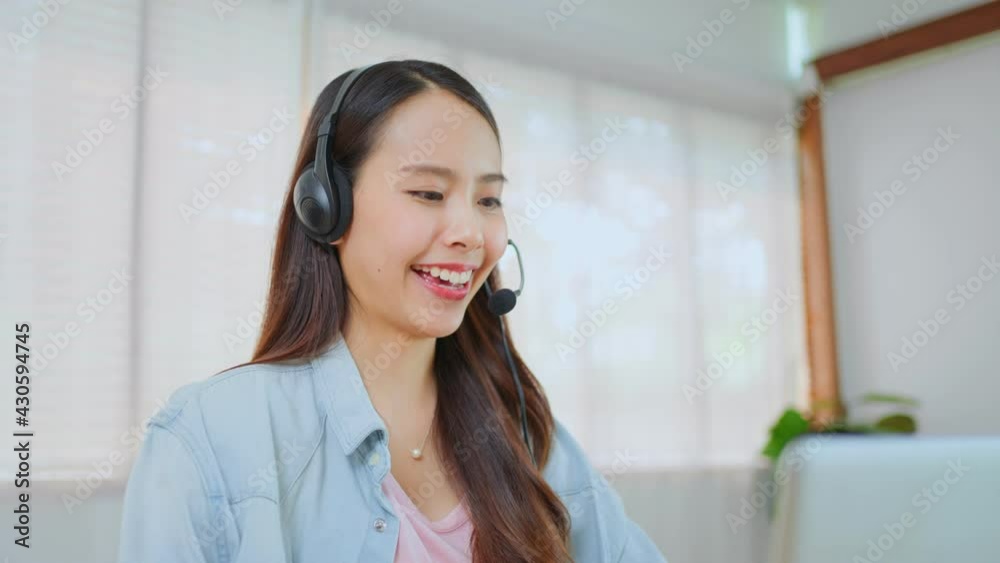 Asian female call center agent talking to customer, working at home. Asian female call center agent talking to customer, working at home.