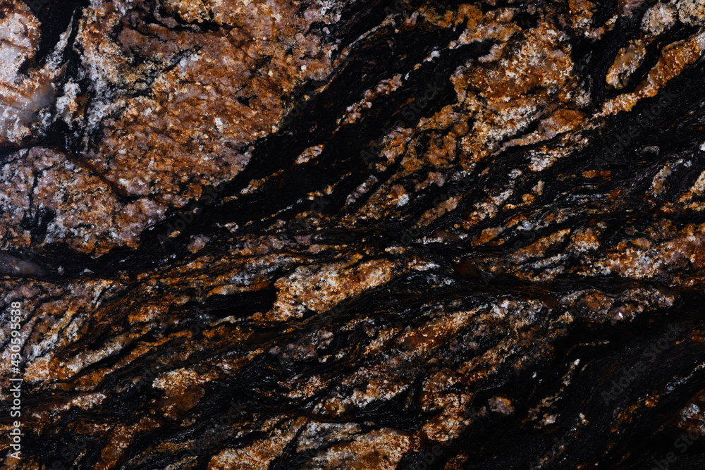 Black Magma granite background in stylish dark color.