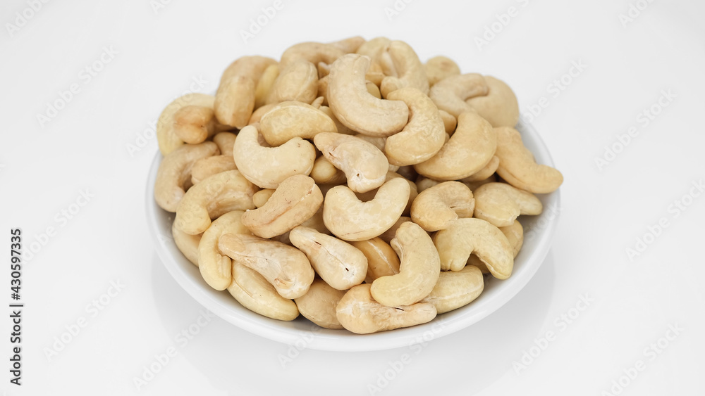 raw cashew nuts isolated on white background. Healthy Food raw cashew nuts isolated on white background. Healthy Food