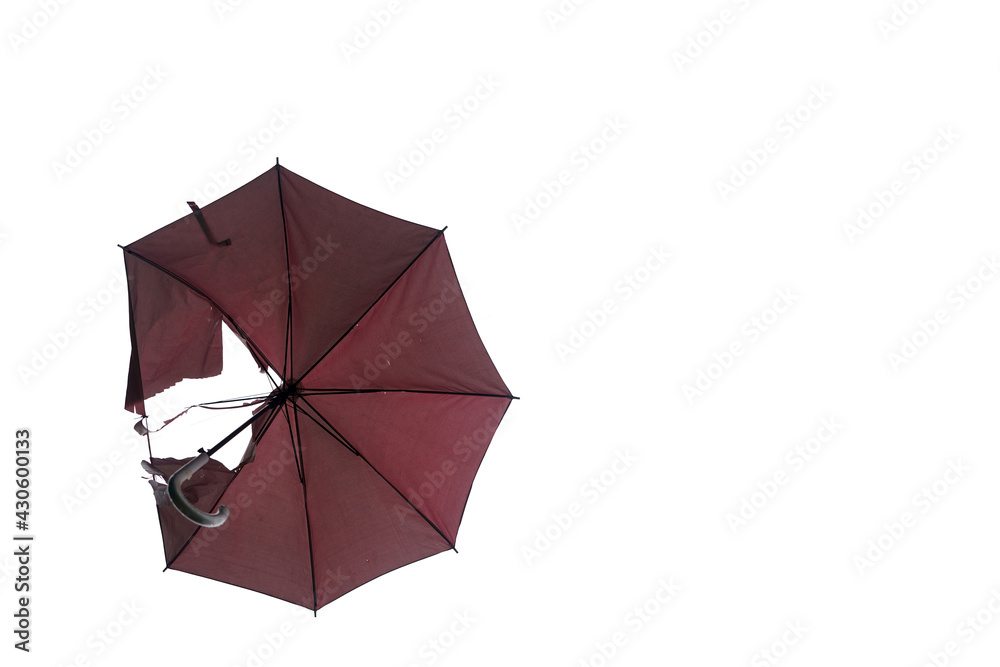 Broken umbrella on white background