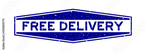 Grunge blue free delivery word hexagon rubber seal stamp on white background