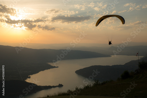 Paragliding and sunset - France