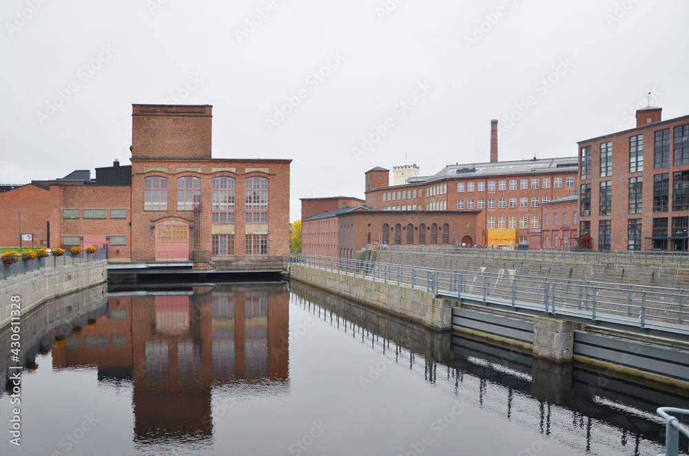 Old factory building of red brick in the autumn. Tampere, Finland
Old factory building of red brick in the autumn. Tampere, Finland