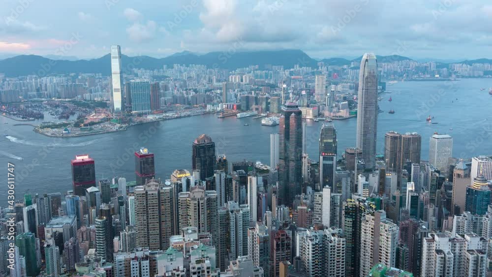 Day to night time lapse of Victoria harbor of Hong Kong city Day to night time lapse of Victoria harbor of Hong Kong city