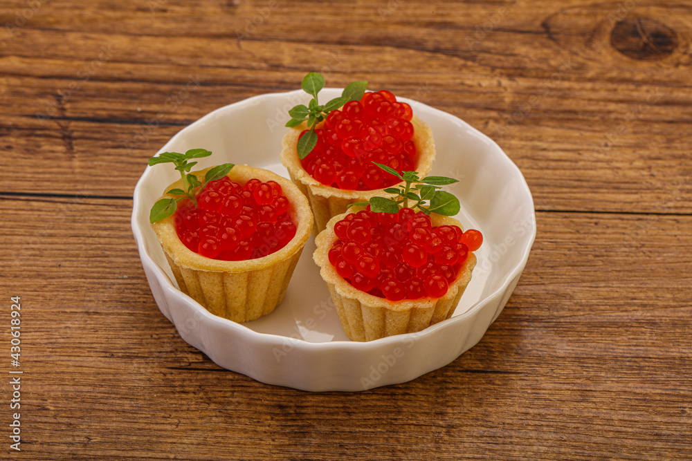 Apetizer - tartlet with red caviar