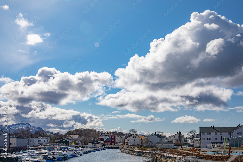 City walk and spring in the air, with white clouds - Here Osen leisure boat Brønnøysund harbor,Helgeland,Nordland county,Norway,scandinavia,Europe