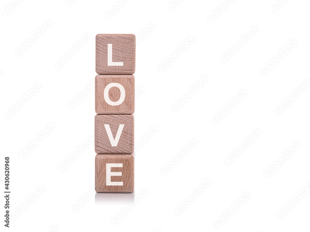 Love. Wooden cubes with the word love on a white background. Love. Wooden cubes with the word love on a white background.