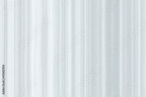 Light gray wood texture with dark stripes.