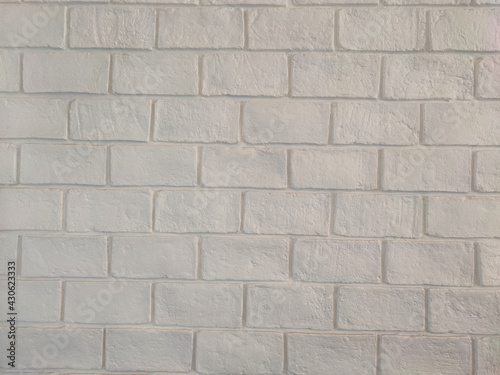 Old white brick for background.