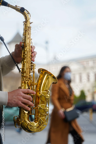 saxophone. saxophone detail in the center of Bucharest, Romania. wind instrument. photo during the day.