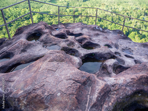 Rock pit at three whales rock or Hin Sam Whales in Phu Sing mountain Country park in Bungkan province, Thailand. photo