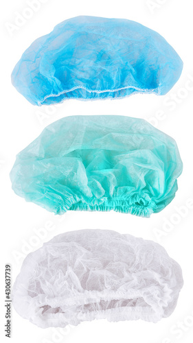 Set of gren, white and blue  medical disposable caps isolated on a white background with clipping path