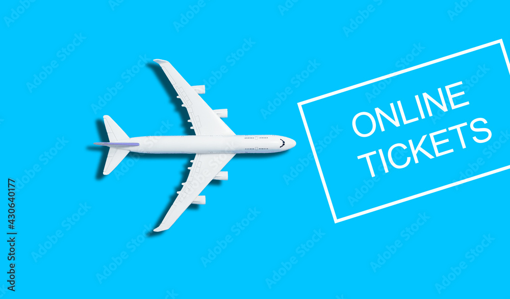Flat lay design of travel concept with plane on blue and yellow background with copy space Flat lay design of travel concept with plane on blue and yellow background with copy space