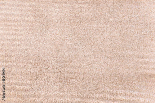 Wheat colour velour textile sample. Fabric texture background