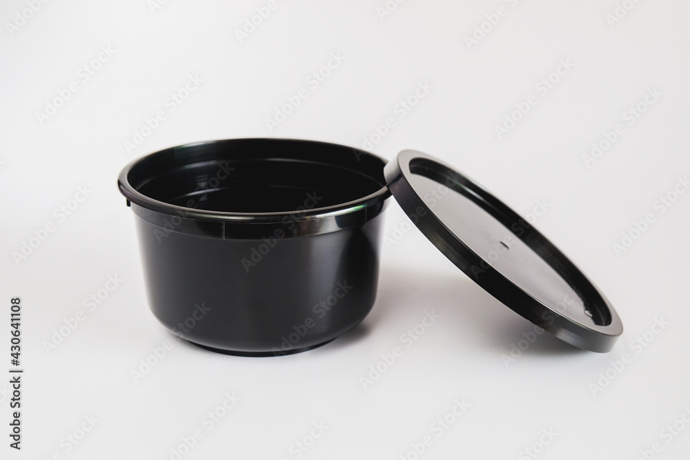 Black plastic food cup on white background. Black plastic food cup on white background.