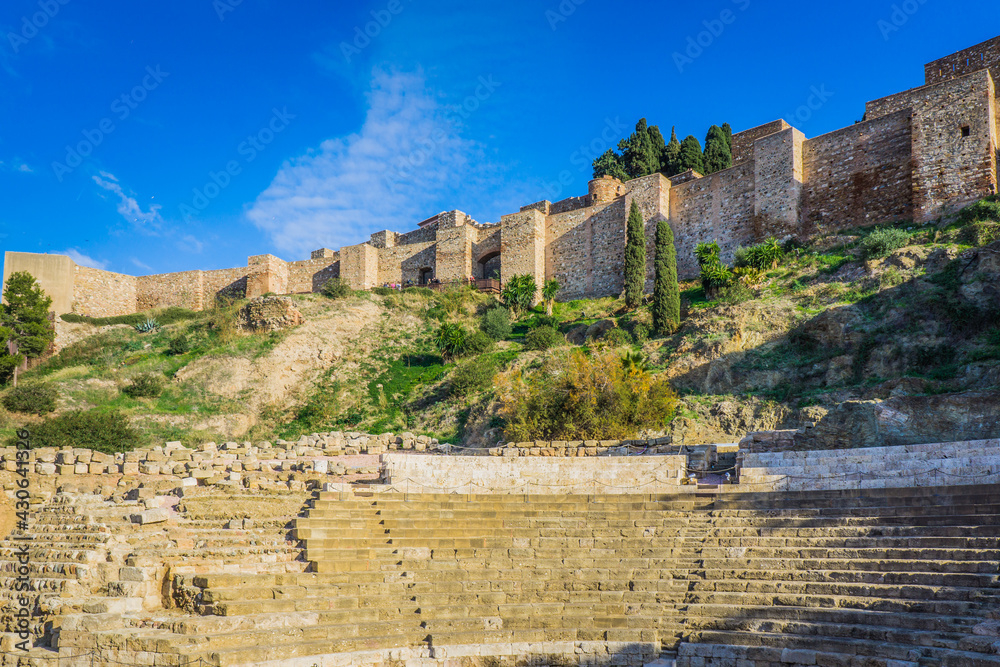 View on the roman theatre and the moorish fortres of the Alcazaba in Malaga (Andalusia, Spain)