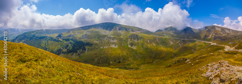 Outstanding panoramic view of Parang Mountains, famous high altitude Transalpina road, Valcea County, Romania © unbolovan