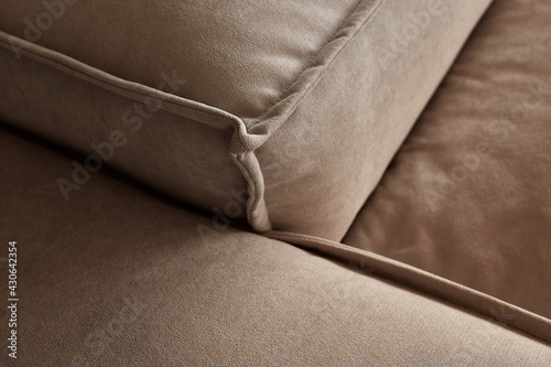 close up design part of sofa detail arm rest and upholstery fabric trim finishing furniture design ideas concept