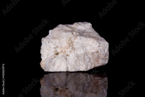 Macro mineral stone Wollastonite on black background