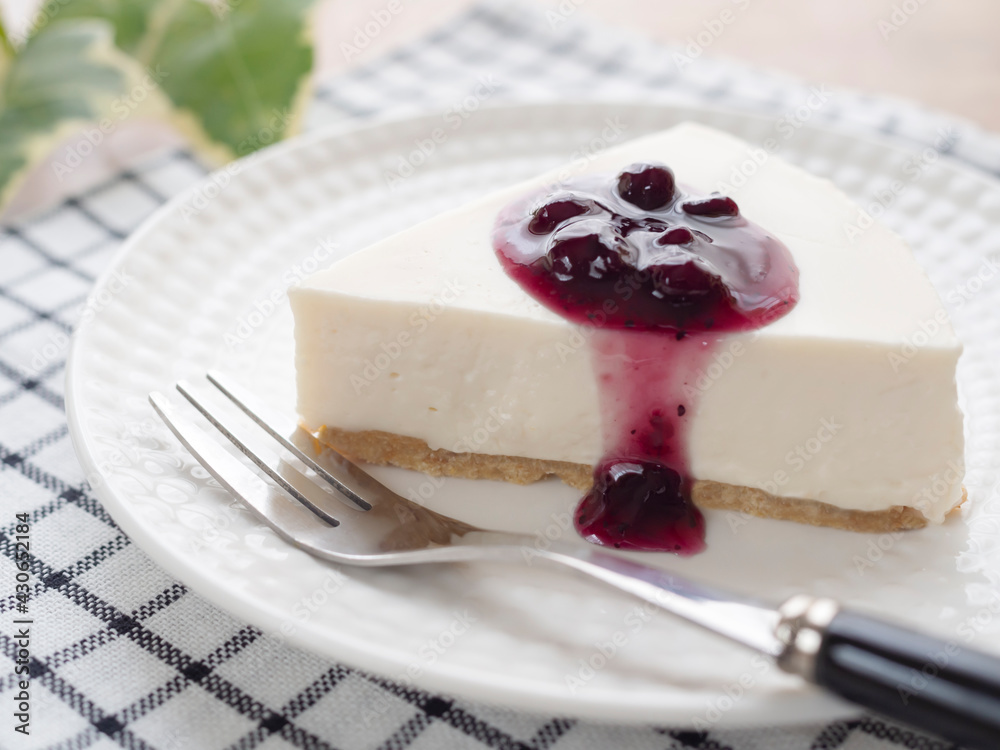 ブルーベリーソースをかけたレアチーズケーキ Stock Photo Adobe Stock