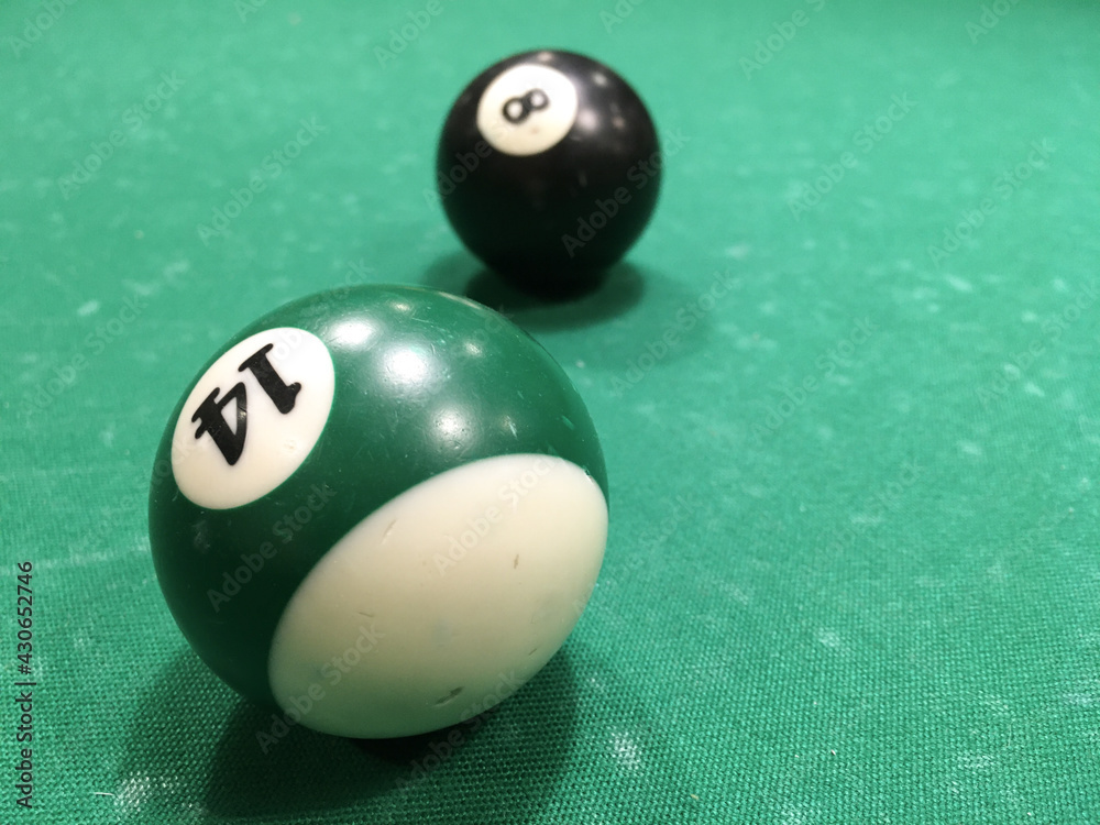 Scratched billiard balls on green scratched billiard table fabric Scratched billiard balls on green scratched billiard table fabric
