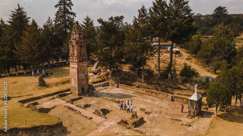Aerial photo of an old church tower, in the municipality of Tlalpujahua, Michoacan, Mexico, only the vestiges of it remain. photo
