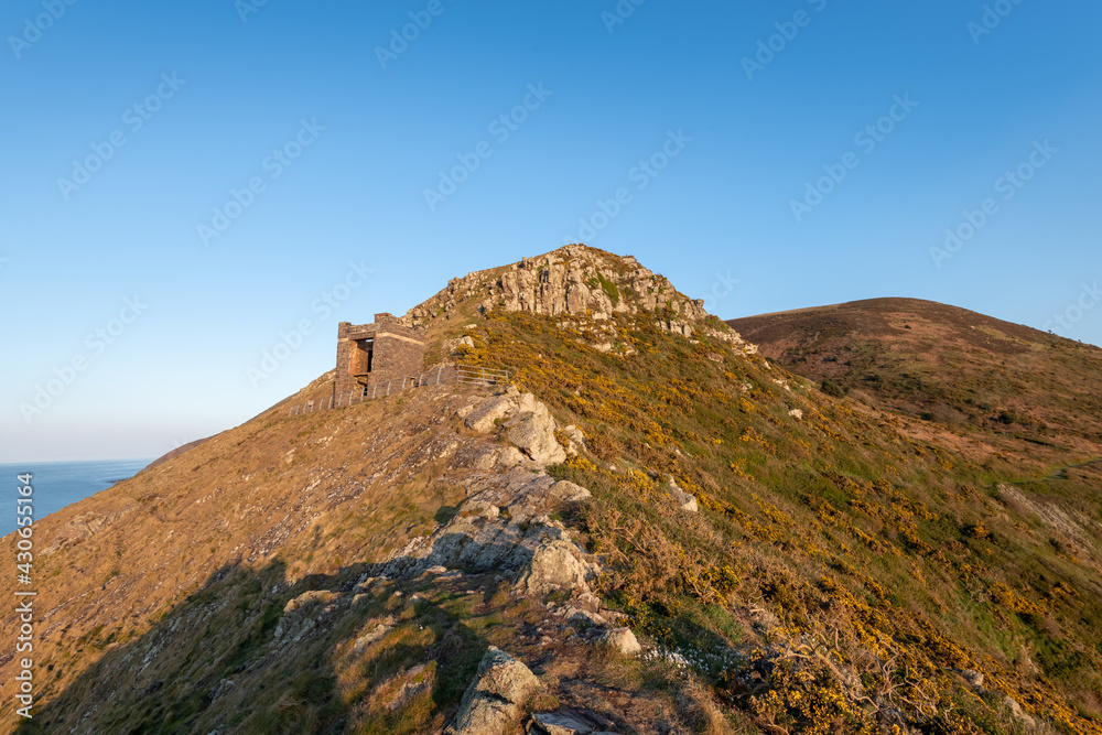Landscape photo of the old coastguard watch tower at Hurlstone Point in Exmoor National Park