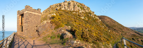 Panoramic photo of the old coastguard watch tower at Hurlstone Point in Exmoor National Park photo