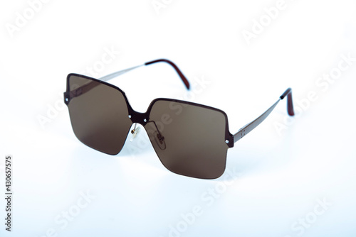 Sunglasses on white background with copyspace