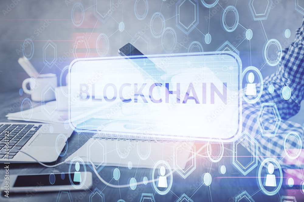 Double exposure of man's hands holding and using a phone and crypto currency blockchain theme drawing. Double exposure of man's hands holding and using a phone and crypto currency blockchain theme drawing.