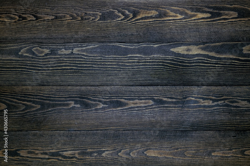natural background of dark wooden planks with veins
