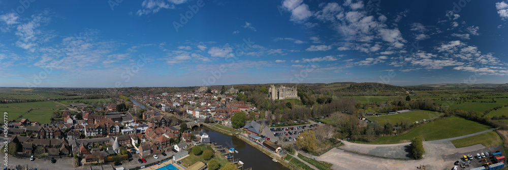 Arundel Town aerial panoramic view of the River Arun running past Arundel Castle and the Cathedral of this popular tourist destination in West Sussex.