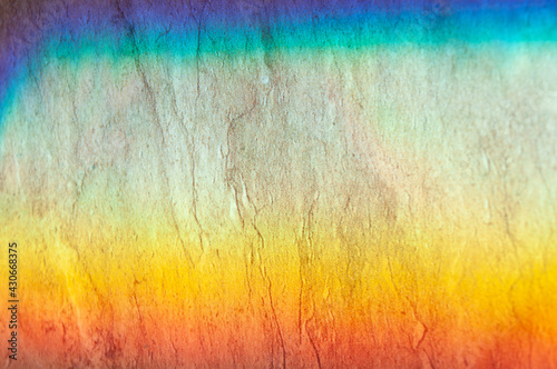 Rainbow colors on the wall, grunge texture